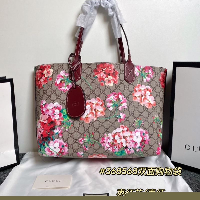 G*u*i shopping bags